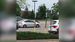 Woman clings to car of shoplifting suspects at Pittsfield Township Lowe's
