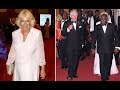 Charles and Camilla attend a state banquet on the last night of their Ghanaian tour
