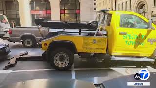 San Francisco woman describes tow truck trying to nab her moving car