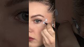 How to make tiny eyeliner ghosts 👻 #halloweenmakeuplook #graphiceyeliner #eyelinerideas