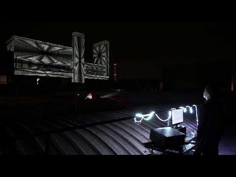 An Impressive and abstract projection mapping show on a colossal building | HeavyM