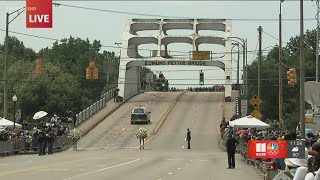 John Lewis' casket crosses Edmund Pettus Bridge for final time in front of emotional crowd