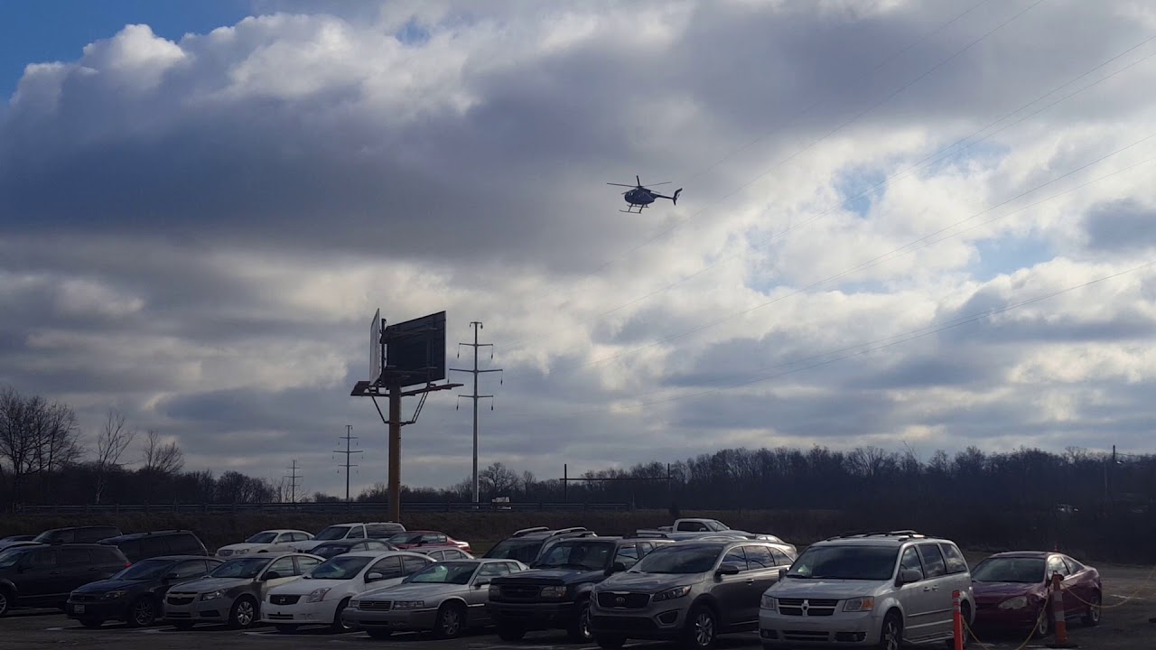 Close up of helicopter pulling power lines - YouTube