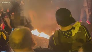 Group burns Black Lives Matter banner taken from DC's oldest Black church during pro-Trump protest