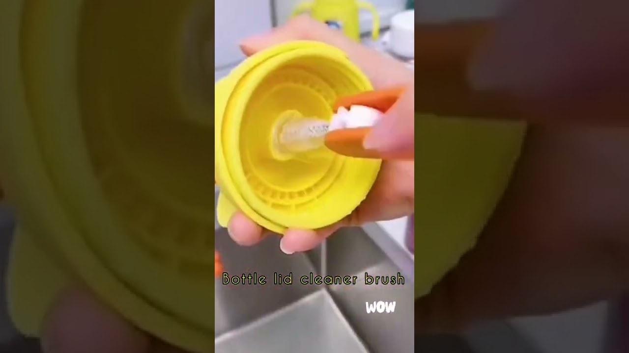 Bottle lid cleaner brush