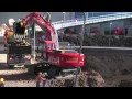 RC Excavator Loading Hook Lifter at the Construction Site