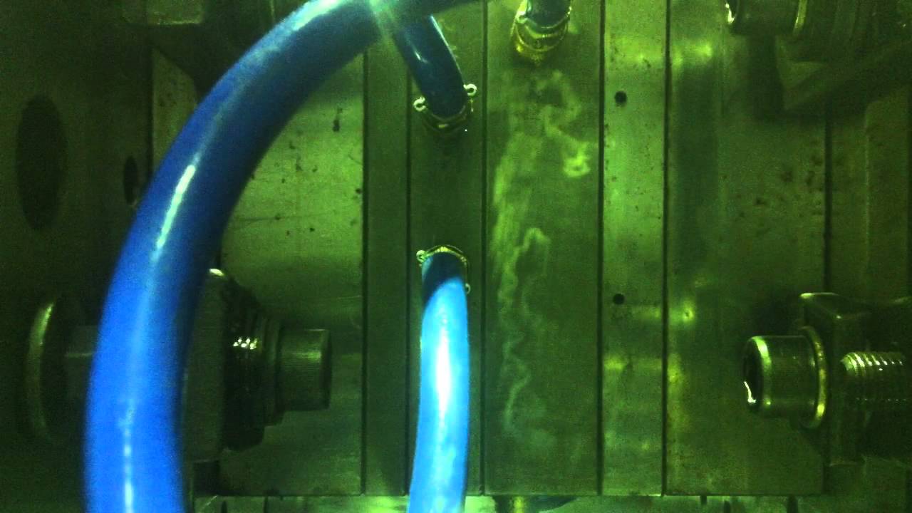 Child Resistant Caps being moulded - International Supply