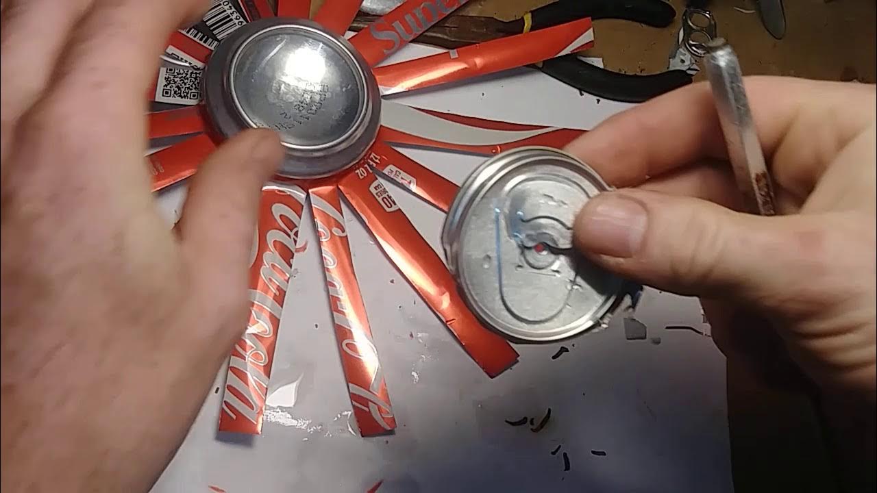 WATCH: She Removes The Top Of A Coke Can And Grabs Spray Paint. I Can't Believe