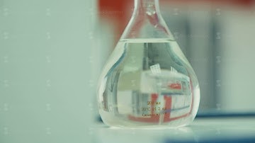 The liquid chemical reagent chemical in a round bottom flask