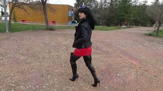 Victoria Devil winter outfit, red vinyl miniskirt, black latex bodysuit, high heeled boots.
