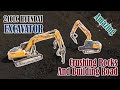 Excavator - 210LC HYUNDAI - Two Excavator Are Crushing Rocks And Building Road