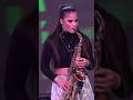 Pretty Saxophone Girl Playing Sax