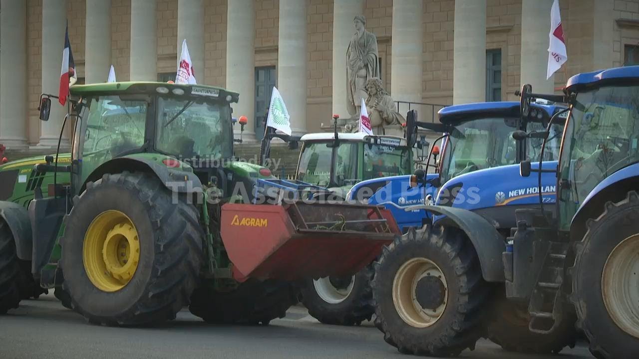 French farmers drive 350 tractors to Parliament to protest low incomes and EU trade deal