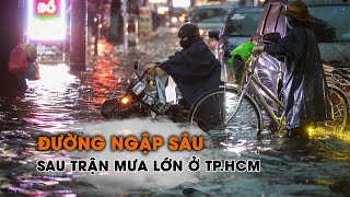 Đường ngập sâu sau trận mưa lớn ở TP.HCM, người dân chật vật về nhà