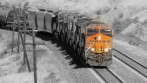 BNSF : Pacing 7 diesels with oil cars : (1 of 7) Rounding a curve towards Tehachapi CA