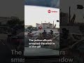 Mitsubishi car rams into other vehicles as policemen attempt to stop it from getting away