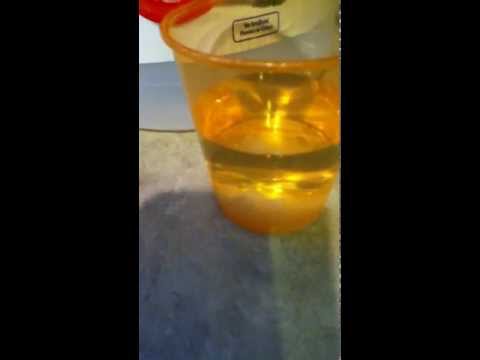 Sugar Cube Dissolving In Vinegar