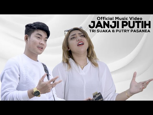 Tri Suaka Ft. Putry Pasanea - Janji Putih (Official Music Video) class=