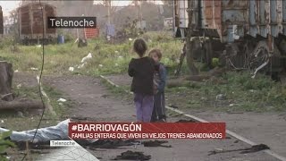 "Barrio vagón": Viven sin agua, sin luz y dentro de trenes abandonados