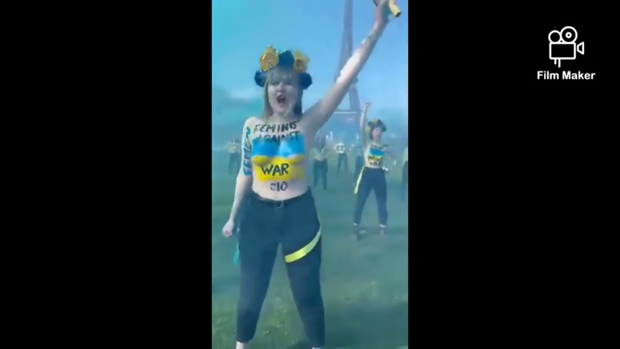 Footage : Women protest Topless against Russia in Paris ( France)