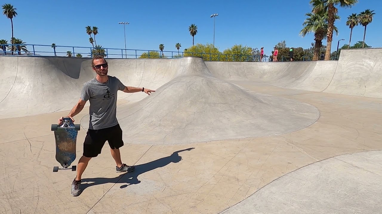 longboarding at a skatepark