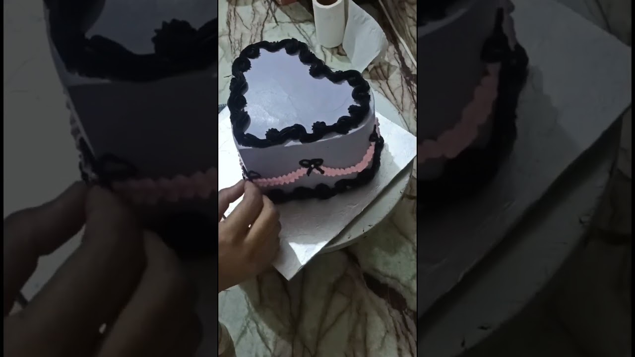 KITTY THEME CAKE IN HEART SHAPE 