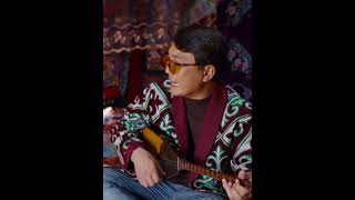 Inside a felt yurt in Xinjiang, the sound of a Dombra fills the air.