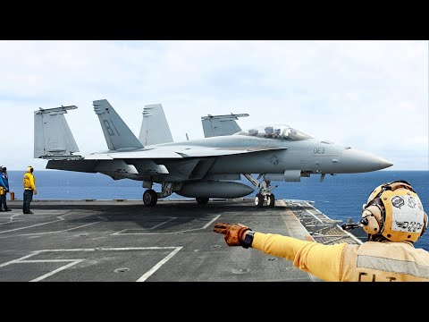 The Crazy Process of Parking Fighter Jets on Tight Aircraft Carrier Flight Deck