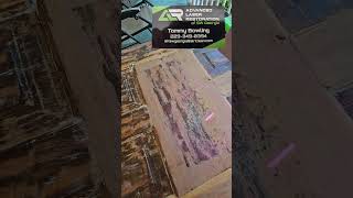 Cleaning a door, using lasers, from a house built in 1900 in Sylvester, Georgia.