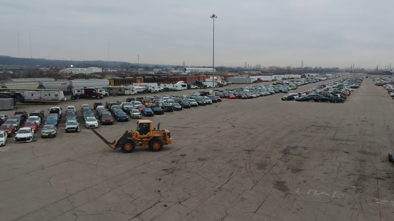 Copart picking up the Infinity G35 filmed with DJI Spark