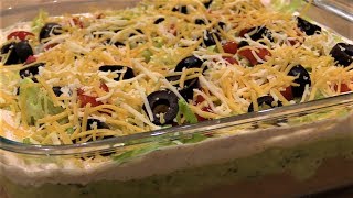 7 Layer Dip Recipe
This 7 layer dip is a crowd pleaser and I show you how I make it. This is my cold version of the dip without meat. Recipe is below!
Check out my warm version of this dip which includes ground beef seasoned with taco seasoning:
https://youtu.be/g4TJ9bp6U2s
Cold 7 Layer Dip Ingredients:
1 can refried beans
16 oz sour cream with a packet of Hidden Valley Ranch Fiesta Seasoning
16 oz guacamole
8 oz shredded lettuce
8 grape tomatoes sliced
1 small can sliced black olives
8 oz shredded cheese
Instructions:
In a Pyrex 8 inch dish, add the following layers:
Layer 1: refried beans
Layer 2: sour cream
Layer 3: guacamole
Layer 4: shredded lettuce
Layer 5: tomatoes
Layer 6: black olives
Layer 7: shredded cheese
Chill in the refrigerator for at least 30 minutes before serving.
Serve with tortilla chips. Enjoy!!!
T-ROY COOKS Merchandise
https://troycooks.myshopify.com/
Click here if you are interested in supporting T-ROY COOKS
http://www.paypal.me/TroyCooks
Thank you very much for the support!!!
Amazon Store for T-ROY COOKS
https://www.amazon.com/shop/t-roycooks
Follow T-ROY COOKS on Social Media:
Facebook:
https://www.facebook.com/TroyCooksGoodFood
Twitter:
https://twitter.com/T_ROY_COOKS
Instagram:
https://www.instagram.com/troy_cooks/
Website:
http://www.TroyCooks.com
Music:
T-ROY COOKS Theme song and Outro are owned & Copyrighted by Troy Smith. Use is forbidden without prior consent from Troy Smith.
Written by: Troy Smith and Nick Tornatore
Performed by: Nick Tornatore
DISCLAIMER: This video description contains some affiliate links, which means that if you click on one of the product links and buy, I will receive a small commission. This helps support T-ROY COOKS and allows me to continue to make videos like this. Thank you for the support! 7 Layer Dip Recipe