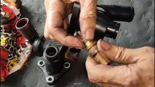 hyundai eon 2015 .how to replace water outlet.?