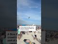 Blue Angels jet flies low over crowd on Florida beach