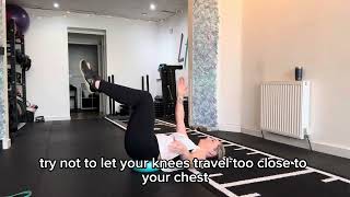 Pilates ball dead bug balance