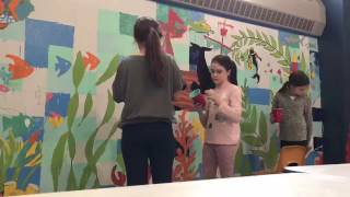 Time-lapse video of Milton childen painting a mural in memory of in art teacher Caitlin Clavette