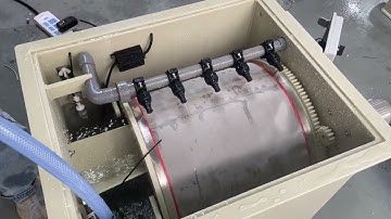 How does the drum filter work automatically?