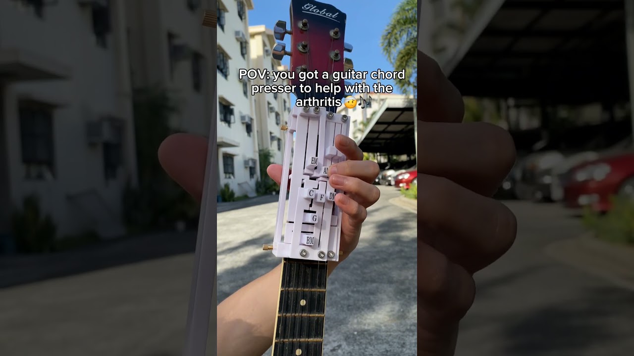 Guitar chord presser 