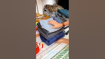 Hộp đựng quần áo bằng vải dày, có quai xách kéo.