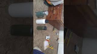 Stanley, ozark trail, and yeti thermos/rambler.