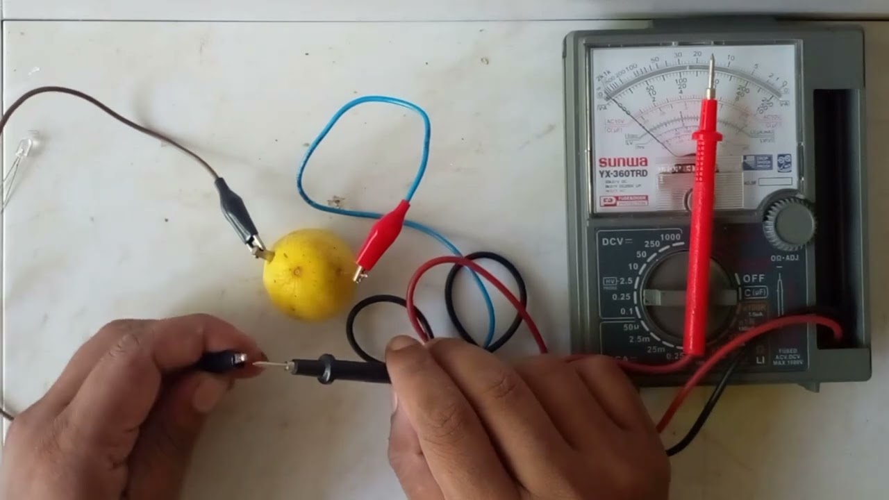 Generating electricity using a lime fruit Iron and Copper battery YouTube