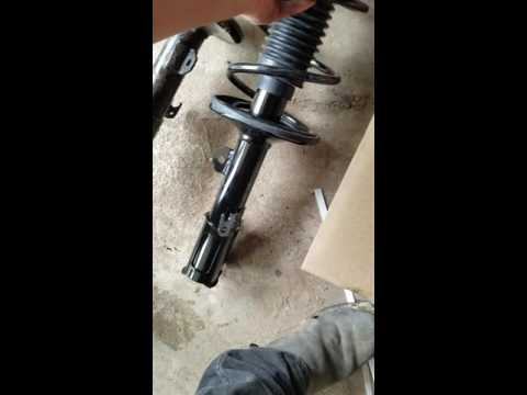 how to change the front left  shock and strut on a 2008 toyota corrola