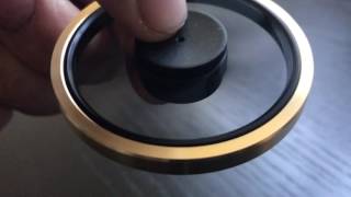 a gold Fidget Spinner wheel - it can take off and roll around