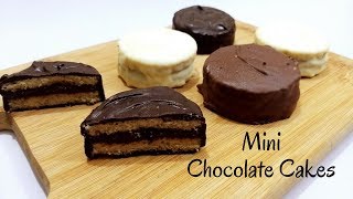 Eggless mini chocolate cake - spongy & delicious dessert cakes recipe
made with two layers of sponge ganache in between....