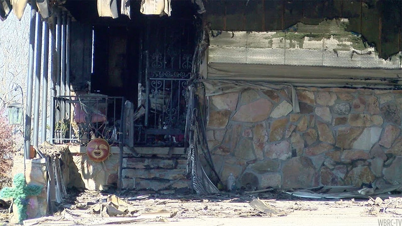 newspaper mockup Roy Moore accuser's home burns, arson suspected