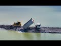 Amazing project shantui and wheel loader sdlg push rock and sand in lake with truck delivery