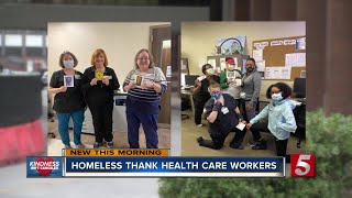 Artists who've experienced homeless create thank you cards for Nashville healthcare workers