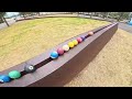 Roll, colorful marbles! Who will win the marble race on the track?