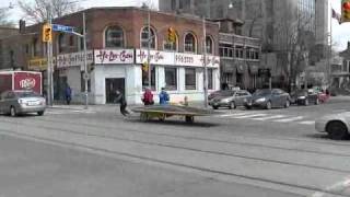 X of 1 Solar Car, being pulled through Toronto.  April 21, 2011.