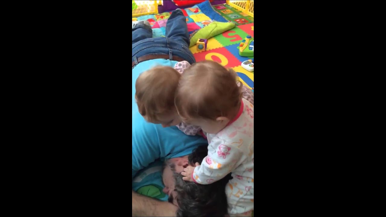 Twin babies confused by snoring grandpa