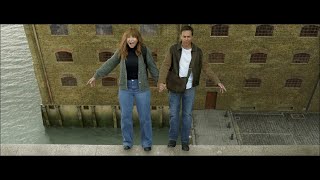 Argylle: Aidan and Elly fall from the roof to save themselves (Sam Rockwell and Bryce Dallas Howard)